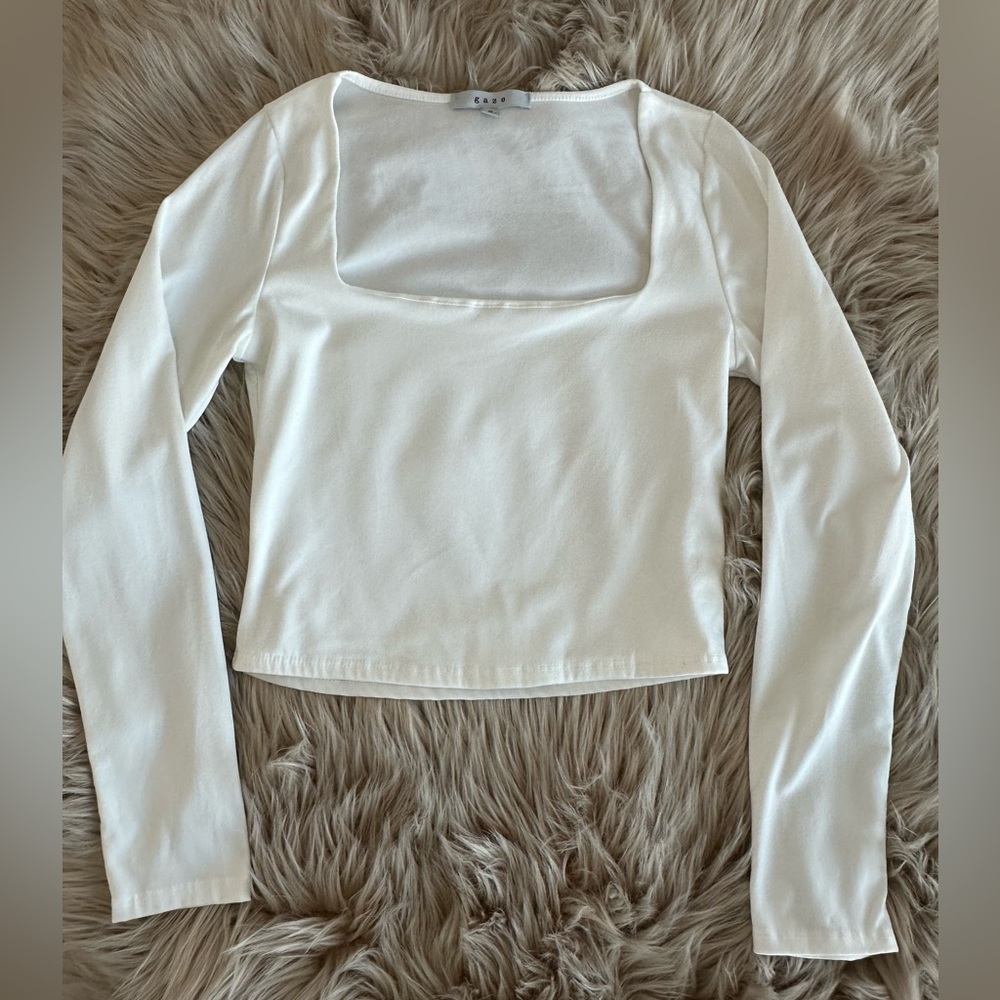 White crop, square neck, long sleeve top.